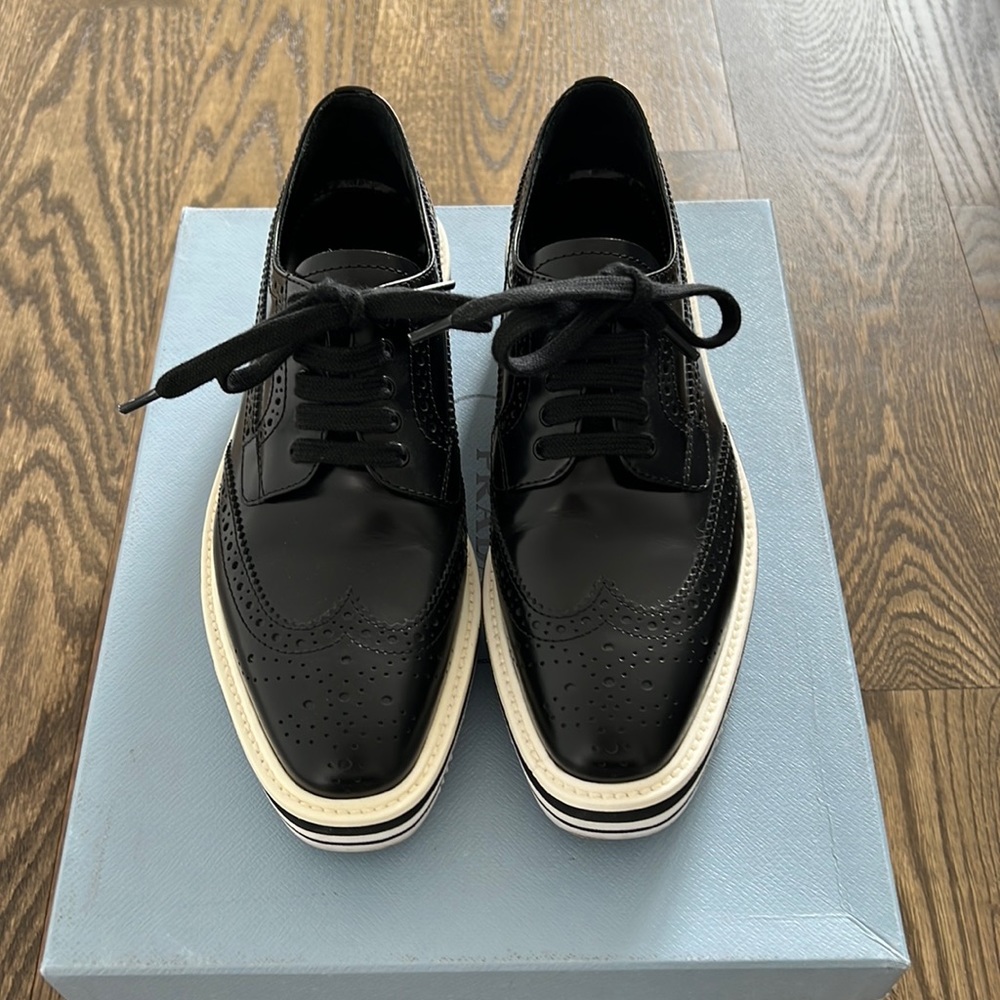 Prada Black Leather Wingtip Platform Wedge Oxfords with White Trim